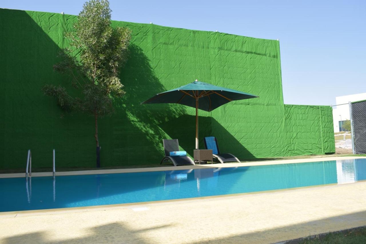 Retaj Salwa Resort & Spa Dauhá Exteriér fotografie A swimming pool in Spain
